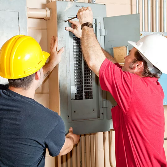 200 amp service upgrade being performed by licensed electricians